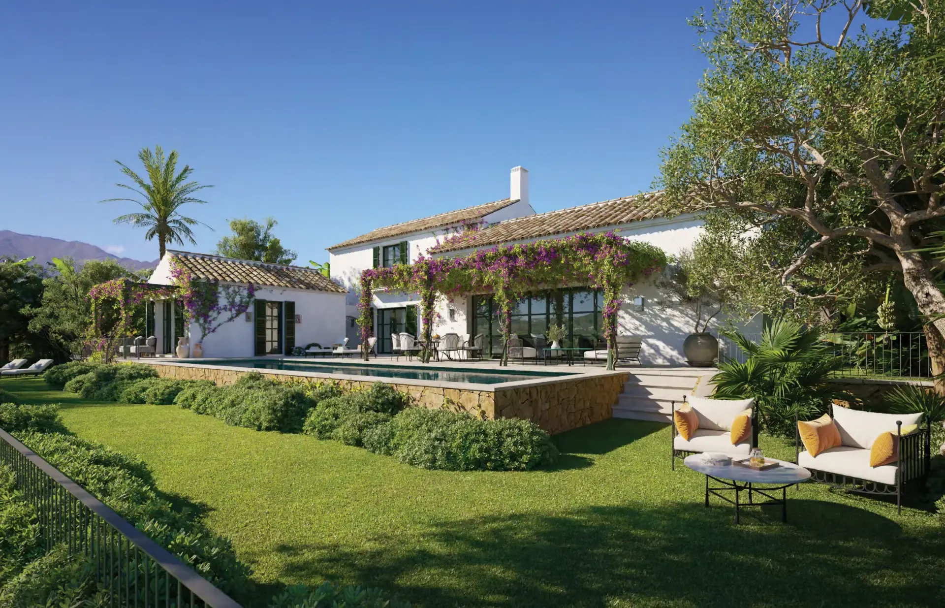 White country house with bougainvillea and a pool